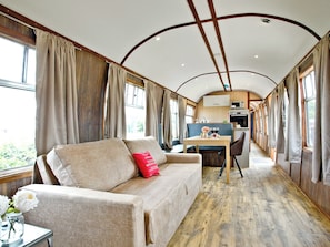 Well presented open plan living space  | Brunel Boutique Railway Carriage No 4 - Brunel Boutique Railway Carriages, Dawlish Warren