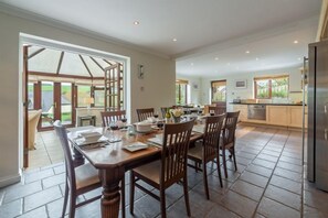 The Summerhouse, Roserrow. Ground floor:  Open-plan dining kitchen and conservatory