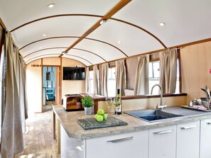 Well presented open plan living space | Brunel Boutique Railway Carriage No 5 - Brunel Boutique Railway Carriages, Dawlish Warren