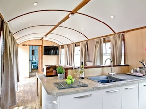 Well presented open plan living space | Brunel Boutique Railway Carriage No 5 - Brunel Boutique Railway Carriages, Dawlish Warren