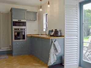 Well equipped kitchen area | The Hen House at The Old Parsonage, Cotebrook, near Taporley