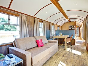 Well presented open plan living space | Brunel Boutique Railway Carriage No 2 - Brunel Boutique Railway Carriages, Dawlish Warren