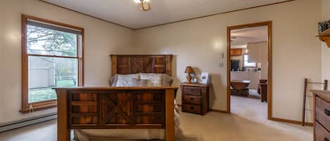Bedroom features reclaimed wood furniture, from the Youngstown Sheet and Tube.