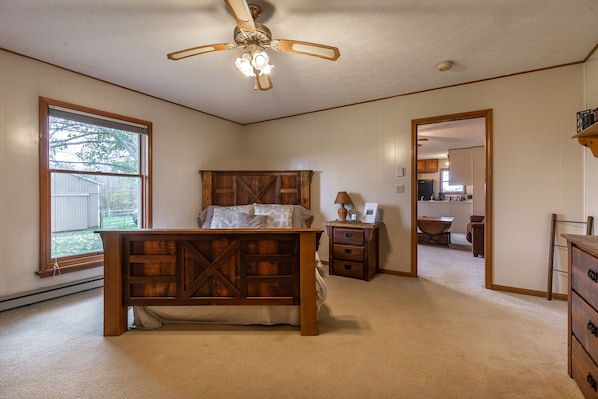 Bedroom features reclaimed wood furniture, from the Youngstown Sheet and Tube.