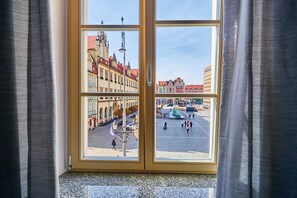 Aesthetic view of the market square visible from the window in the living room.