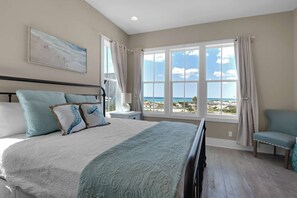 Wake-up and go to sleep, surrounded by the beauty of the Emerald Coast in this fabulous Master Suite, complete with a King sized bed.