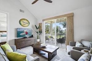 Living Area with Plenty of Seating and Lanai Access at Waikoloa Hawai'i Vacation Rentals