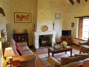 Living room with wood burner | Provence - Tregrill Farm Cottages, Menheniot, near Liskeard
