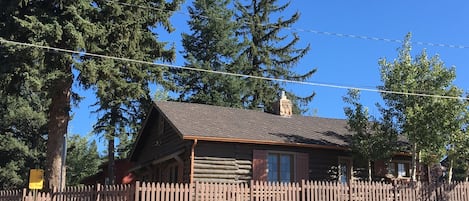 Sugar Shack Lodge a true 1930's cabin with full fenced-in yard, private hot tub and dog friendly!