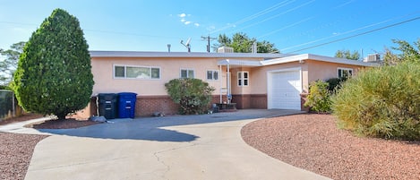 Your ABQ home away from home, front Drive, parking space for several cars.