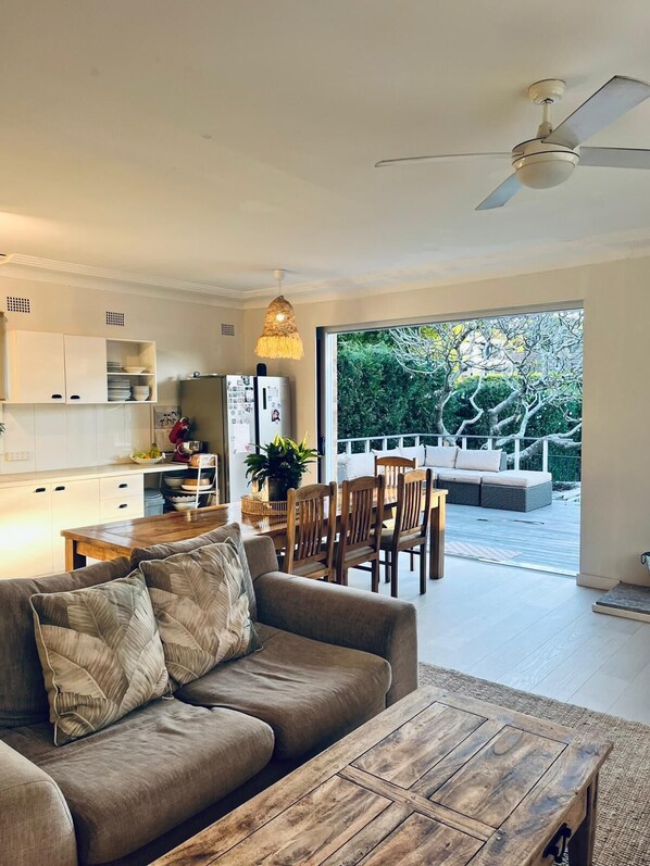 Open plan lounge opening out onto deck.