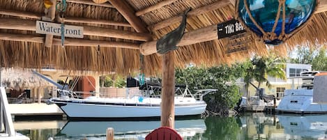 Waterfront Tiki offers relaxation while watching wildlife swim right to the dock
