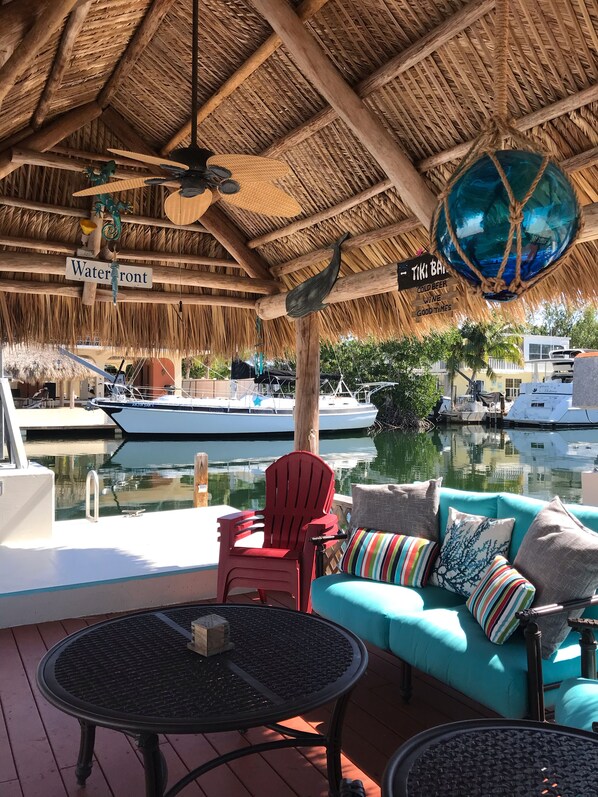 Waterfront Tiki offers relaxation while watching wildlife swim right to the dock