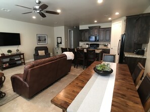 Kitchen table that seats 6 with full access to the TV.