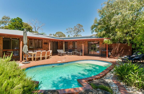 The Pool House offers a sun filled pool area with solar heating and sun lounges