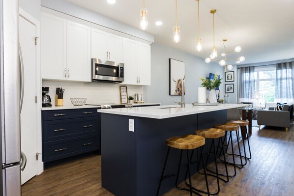 Comfortable breakfast bar with high quality granite countertops!