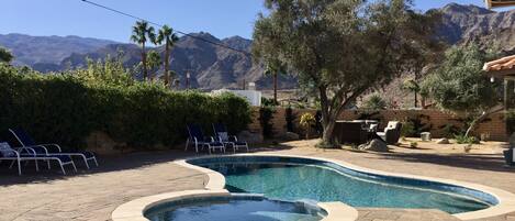 Large extended backyard with views of the mountains all around.