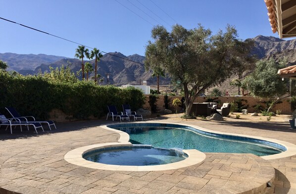 Large extended backyard with views of the mountains all around.