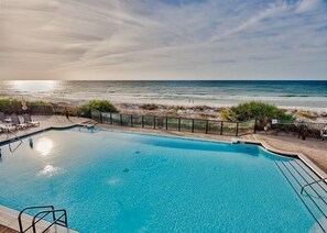 The private pool at Villa Coyaba - Lounge by the pool, heated in cooler months and surrounded by loungers and tables for your comfort and convenience. Just steps from the Villa Coyaba 102 patio, enjoy true luxury living at the beach.