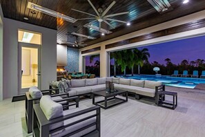 Poolside furniture at twilight