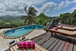 Sunning deck overlooking pool