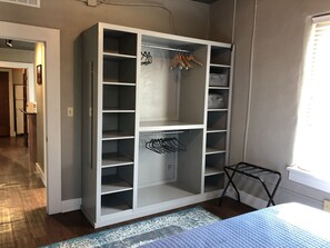 A large open closet provides plenty of storage.