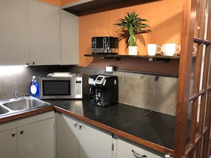 Enjoy the full kitchen with appliances and basic cook ware.