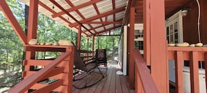 The cabin’s private deck is an unbeatable spot for a siesta.