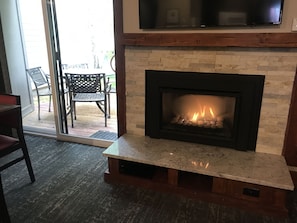 Gas fireplace with thermostat