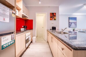 Kitchen - Fridge, oven & microwave
