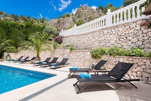 Fantastic pool deck with a scenic Mountain view.