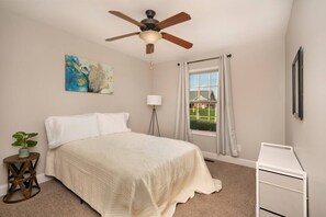 Bedroom # 2 with full size bed and black out curtains. 