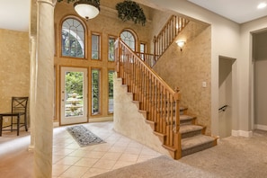 Grand entryway and staircase - one of our favorite areas for family photos!