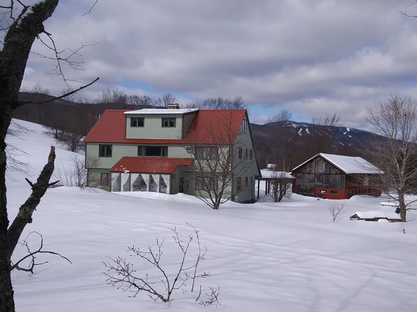 Ski Season at St. Joseph's Dwelling Place, with Okemo visible from our backyard.