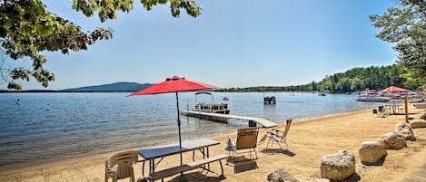 Soak up the sun on the private sand beach at this 3-bedroom, 1-bath cottage!