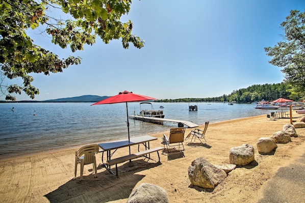 Soak up the sun on the private sand beach at this 3-bedroom, 1-bath cottage!