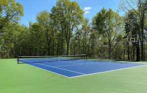 Tennis Court (USTA grade) with Basketball Hoop.
