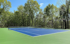 Tennis Court (USTA grade) with Basketball Hoop.