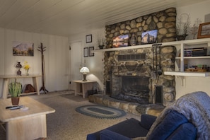 Rock fireplace in the living area.