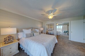 Master bedroom with a king size bed.
