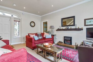 Spacious Sitting Room with feature 200 year old oak beam mantle