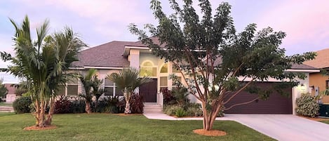 Front of house with lush landscaping