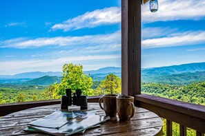 Enjoy your morning cup of coffee from the porch of Azure Heights Lodge.