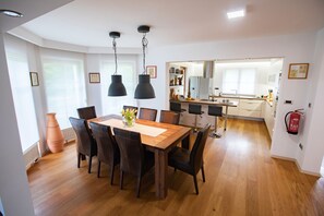 Proximity of dinning room and kitchen serve well for family gatherings.