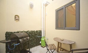 Duplex A - Back yard with BBQ next to the kitchen/living (ground floor level)