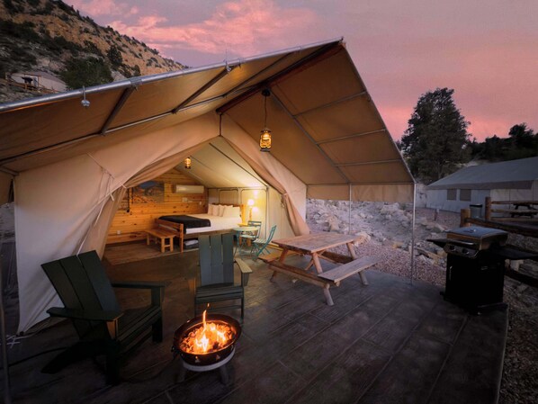 Glamping Tent 6 at East Zion Resort with bbq grill, fire pit, king bed, heating and air conditioning.