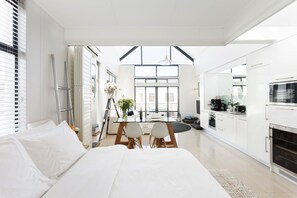 The bedroom can be closed off with moving shutters