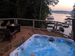 Enjoy the hot tub and fire pit after a day on the lake