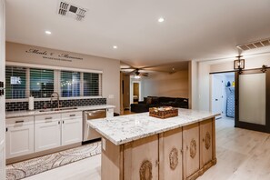 Open and inviting kitchen flows well to main seating area