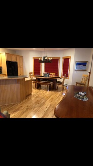Dining area- windows with views of the valley below.
